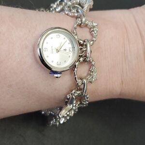 Silver tone beach themed charm bracelet watch